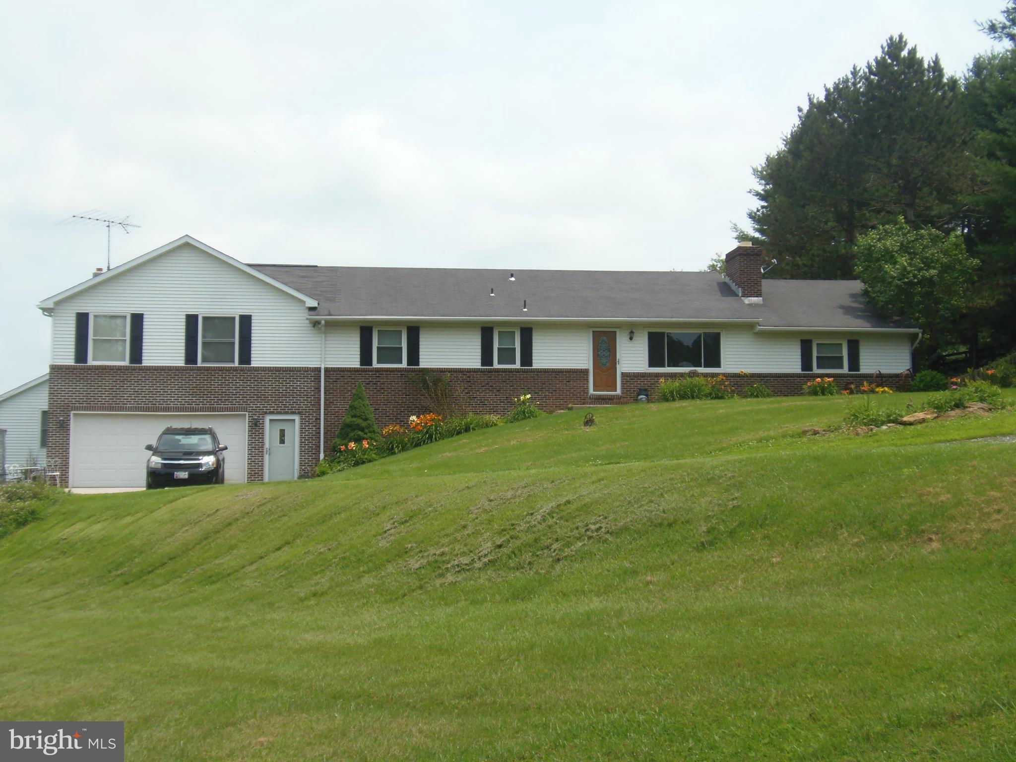 5249 Carroll Warehime Road Manchester, MD 21102 - Photo 1 of 26 a view of a house with a big yard