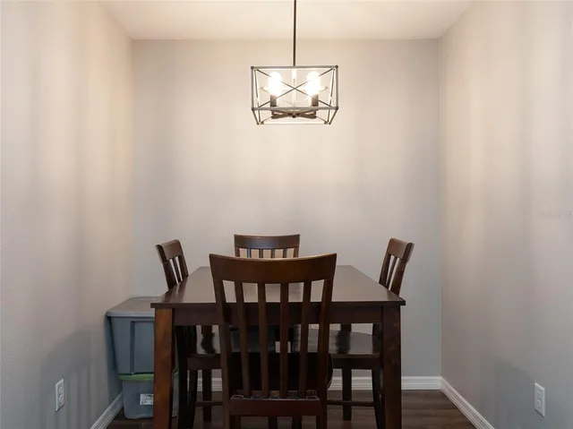 a view of a dining room with furniture