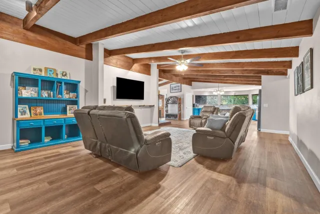 a kitchen with a table and chairs in it