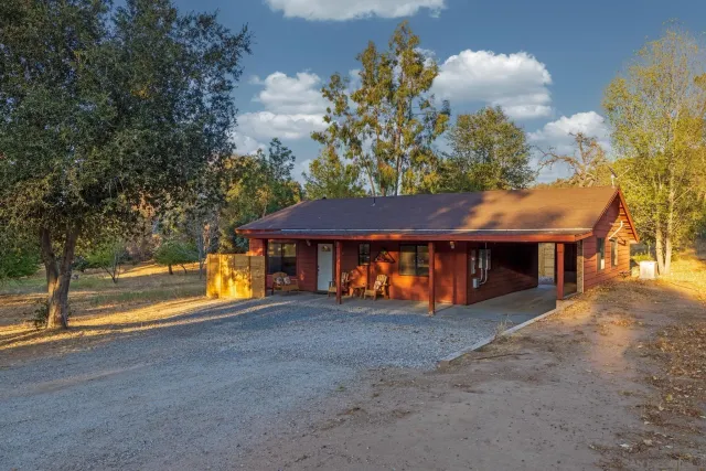 a view of yard with patio