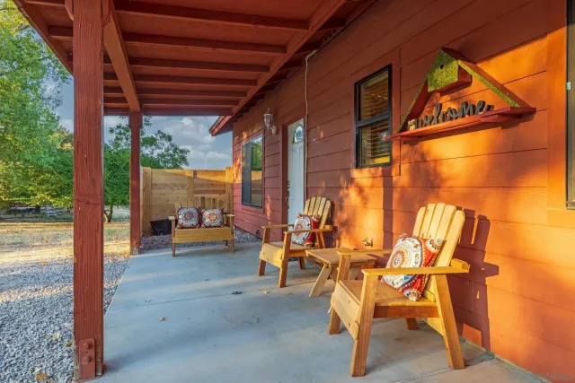 a kitchen with a sink a stove and cabinets