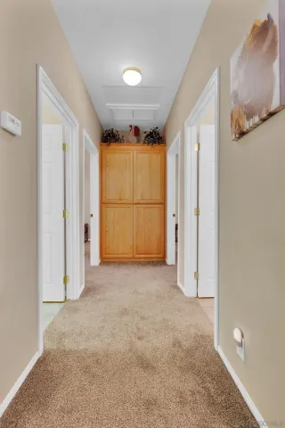 a spacious bathroom with a sink and a mirror
