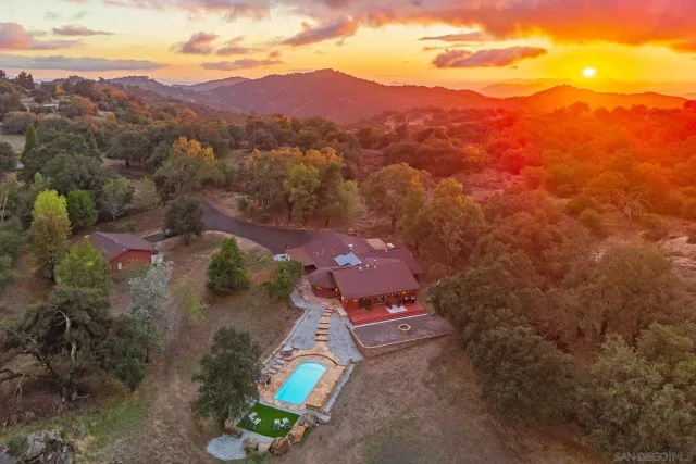 a view of a city with mountains in the background
