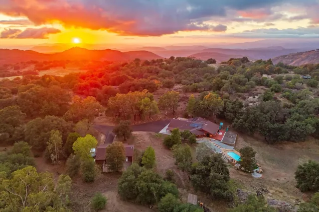 a view of a city with mountains in the background