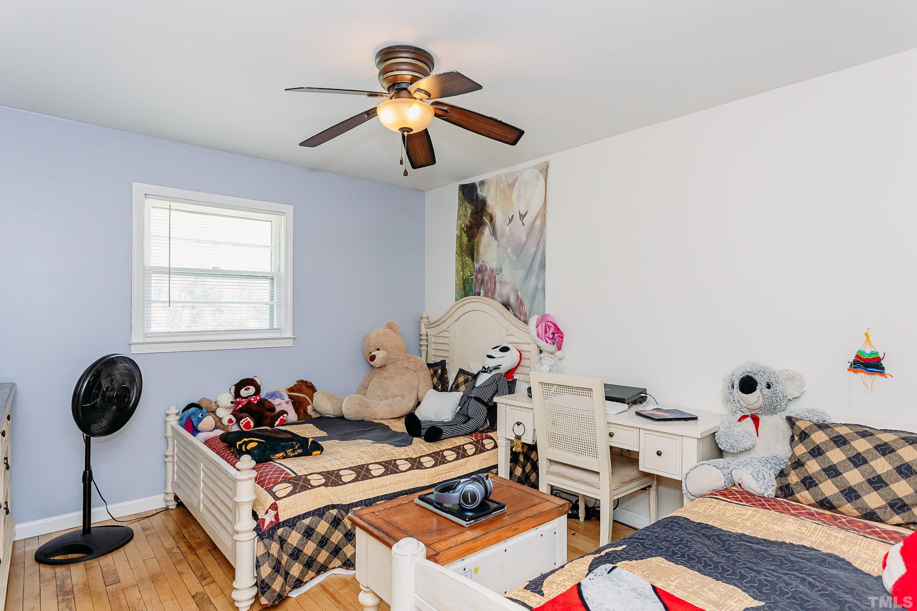 601 Fees Branch Road Lansing, NC 28643 - Photo 29 of 72 a room with furniture a chandelier and a window