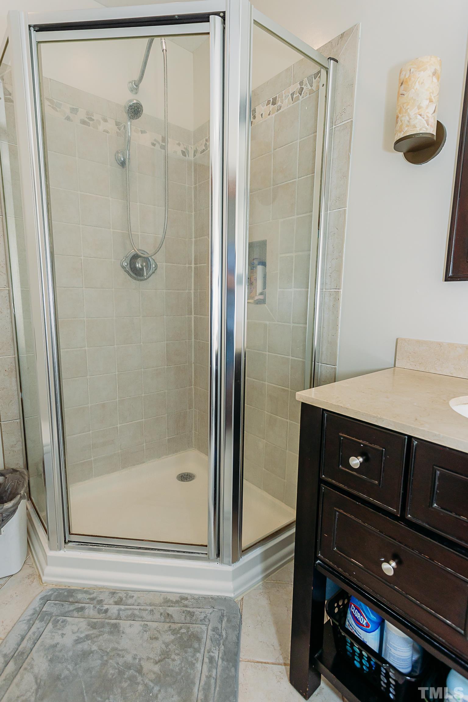 601 Fees Branch Road Lansing, NC 28643 - Photo 30 of 72 a bathroom with a shower and a sink