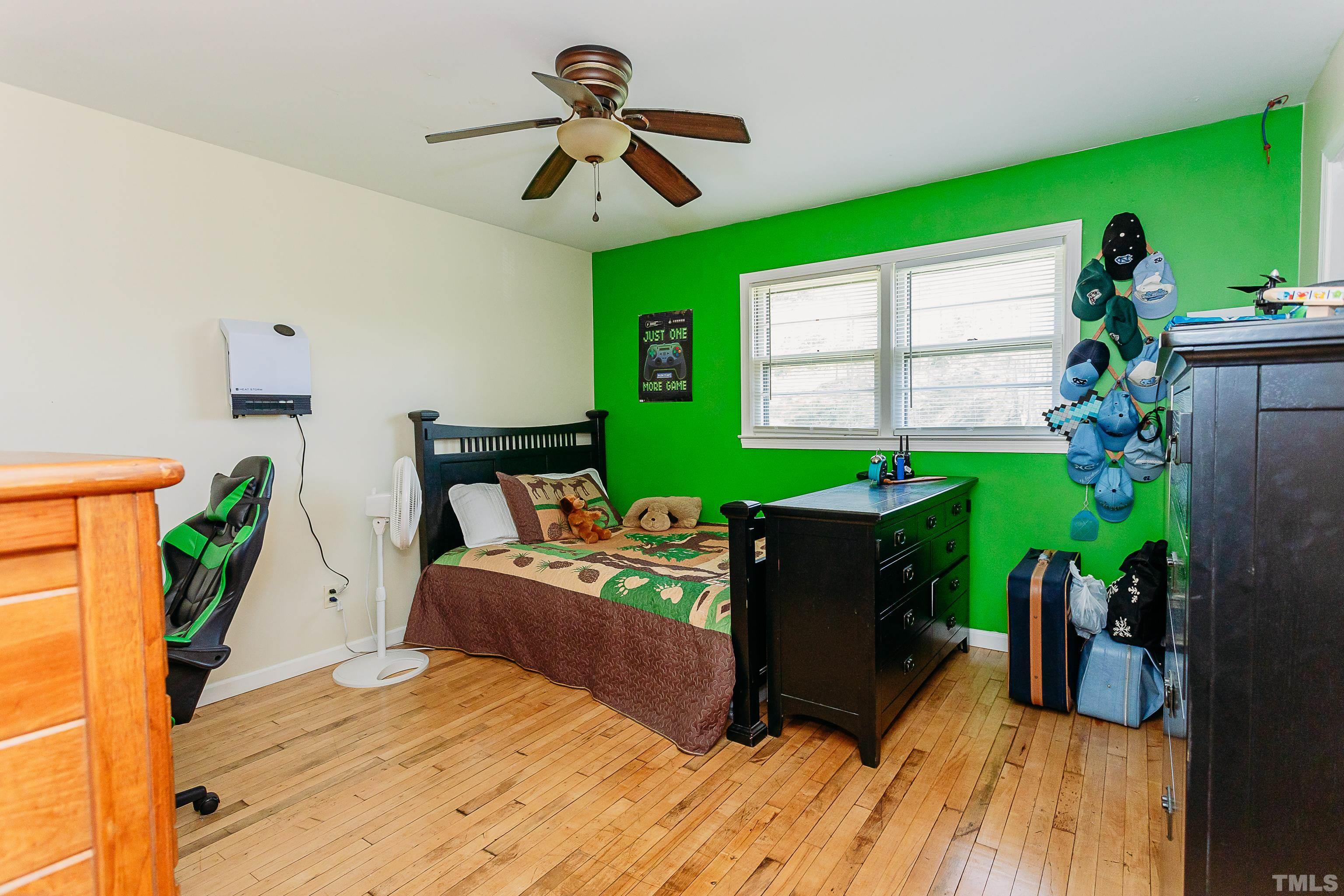 601 Fees Branch Road Lansing, NC 28643 - Photo 33 of 72 a bedroom with a bed and a large window