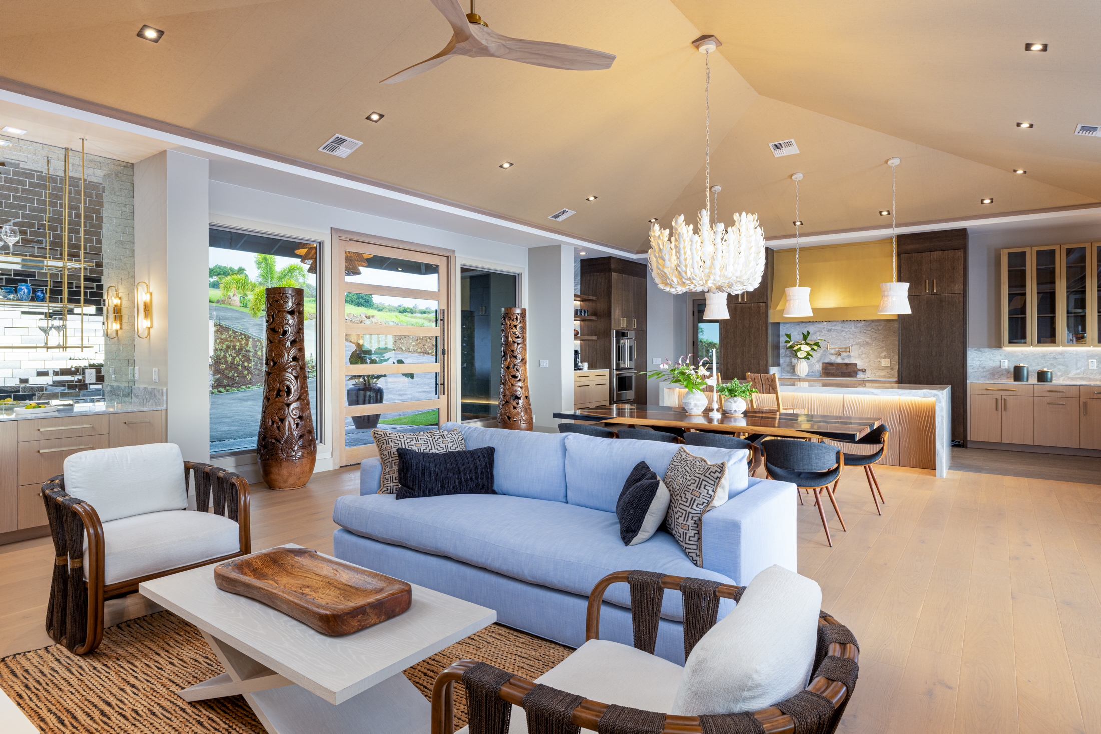 81-6513 Laupai Way Captain Cook, HI 96704 - Photo 11 of 30 a living room with fireplace furniture and a chandelier