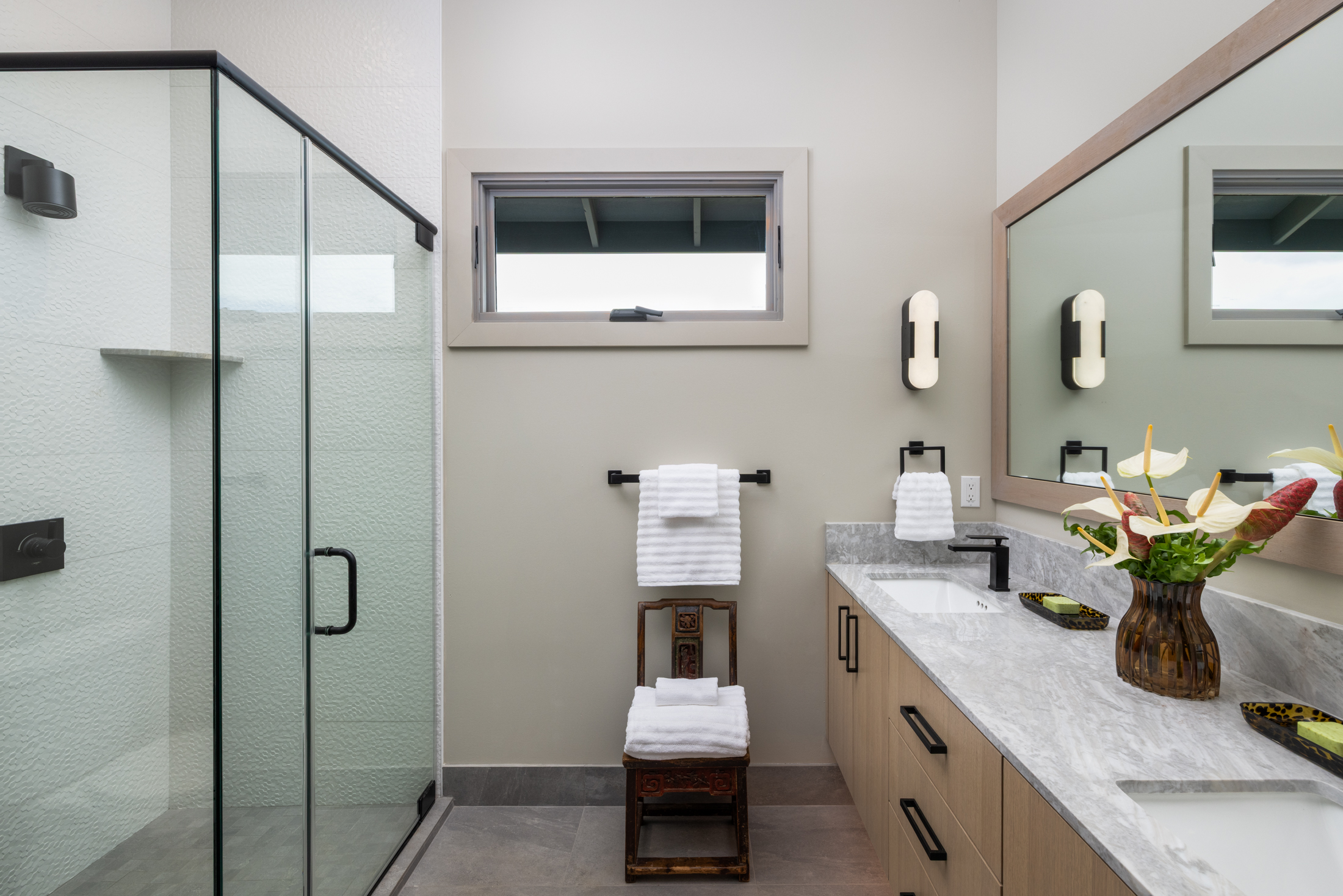 81-6513 Laupai Way Captain Cook, HI 96704 - Photo 22 of 30 a bathroom with a granite countertop sink a mirror and shower