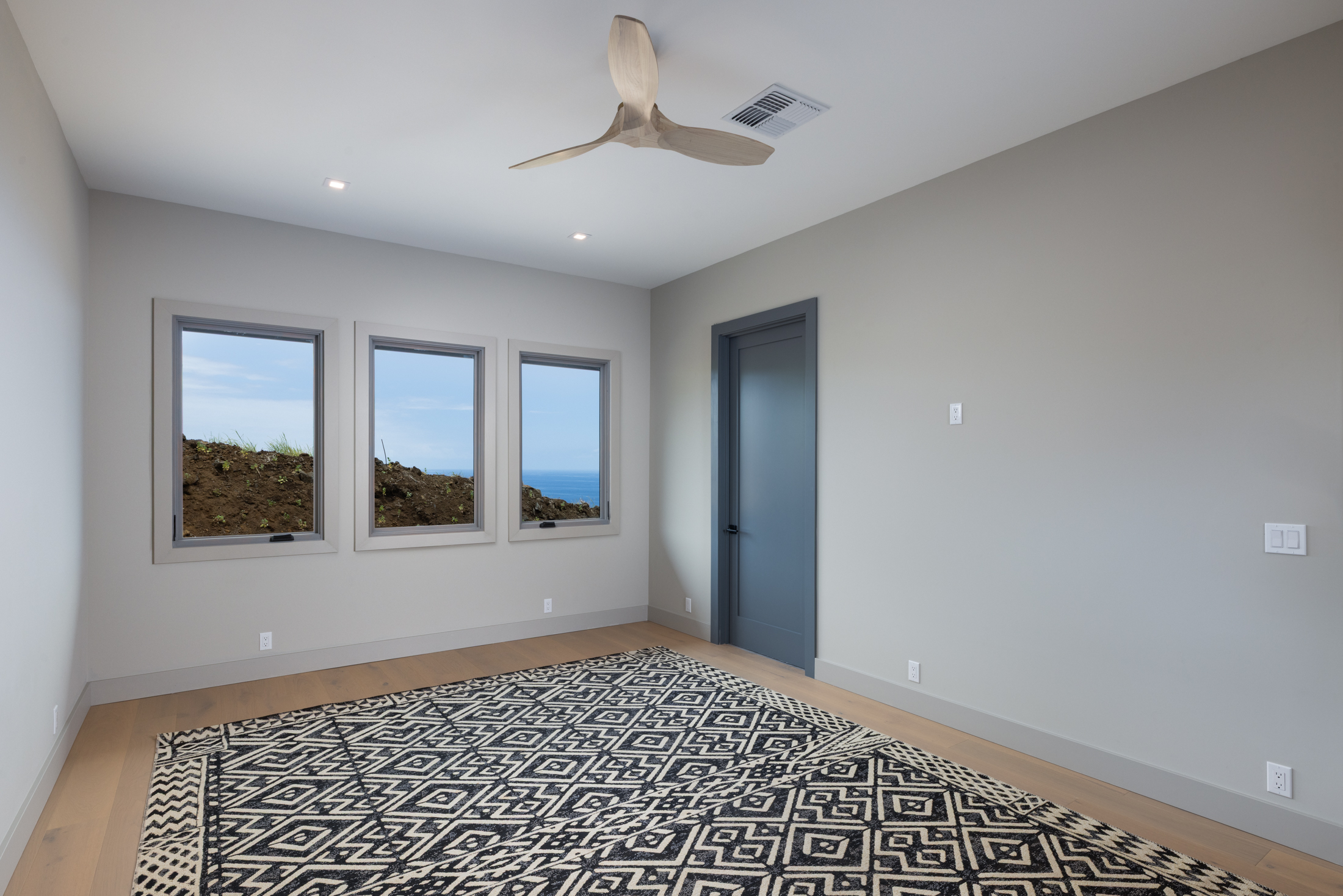 81-6513 Laupai Way Captain Cook, HI 96704 - Photo 23 of 30 a view of an empty room with a window