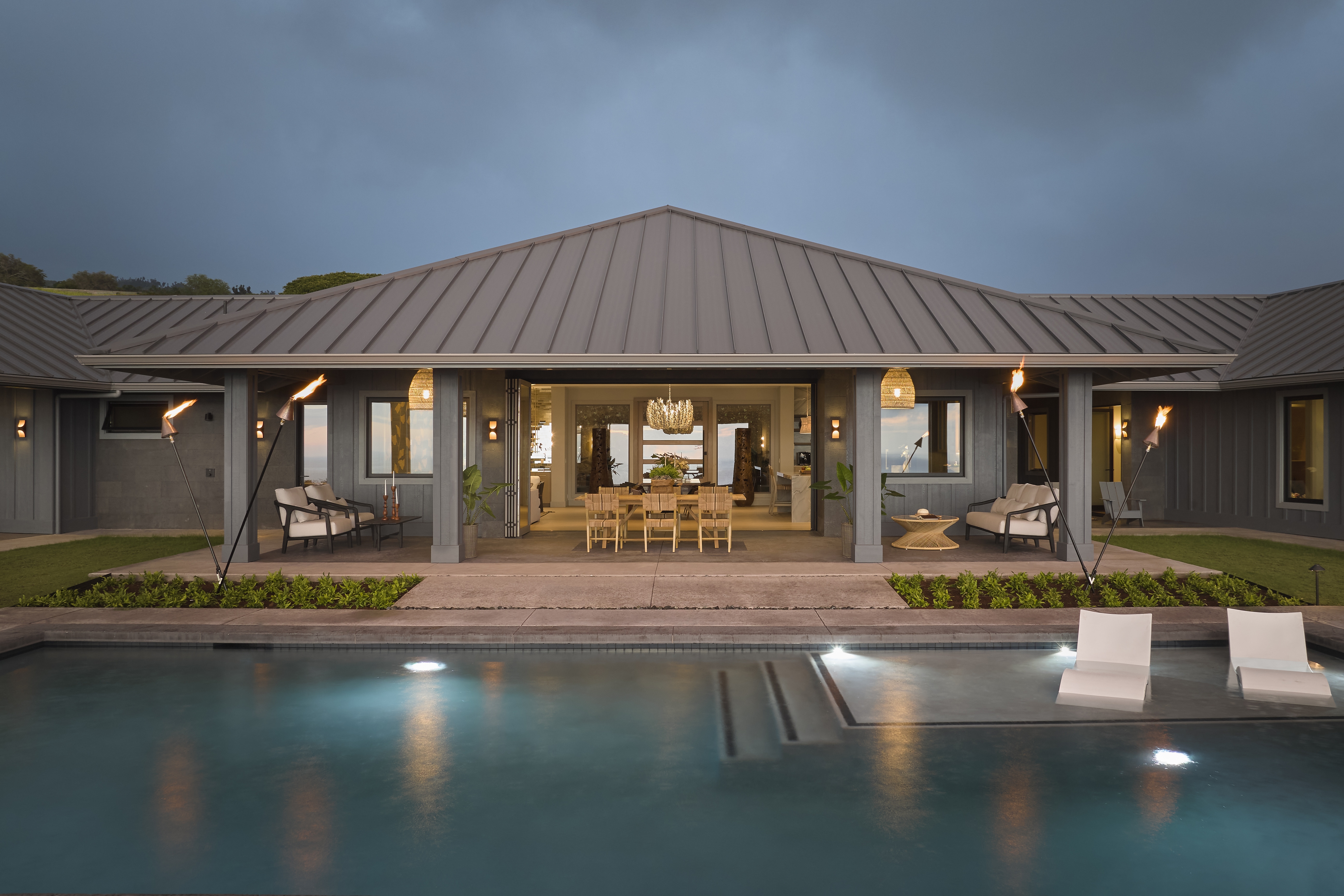 81-6513 Laupai Way Captain Cook, HI 96704 - Photo 26 of 30 a view of pool with table and chairs under an umbrella