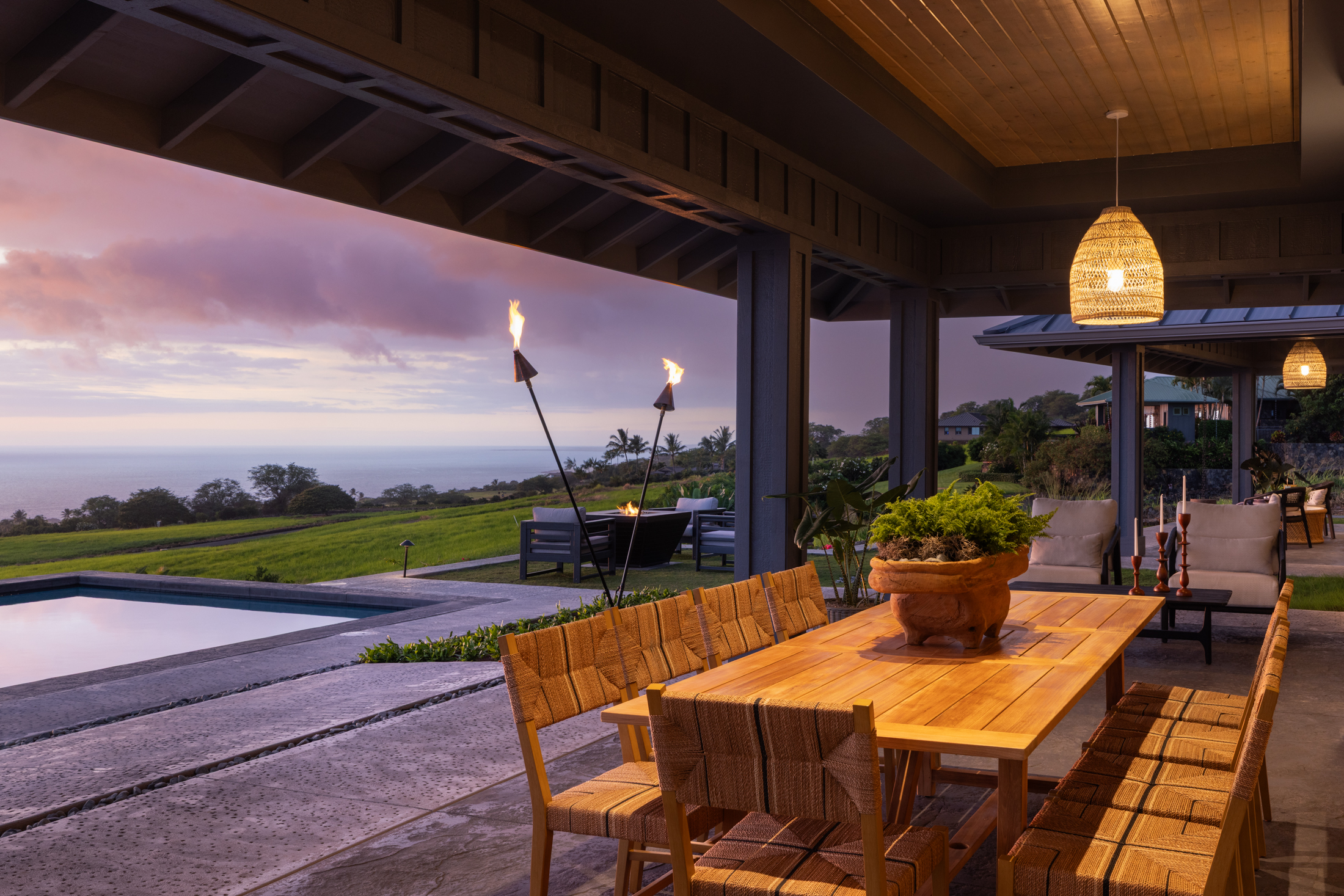 81-6513 Laupai Way Captain Cook, HI 96704 - Photo 3 of 30 a view of a patio with a table and chairs
