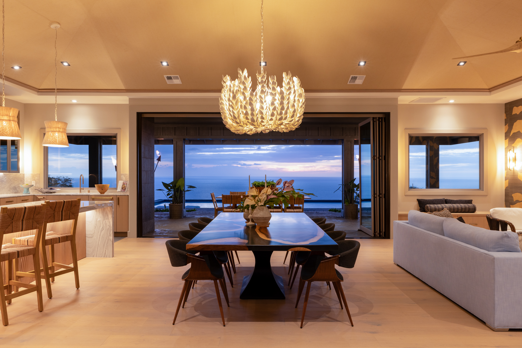 81-6513 Laupai Way Captain Cook, HI 96704 - Photo 4 of 30 a view of a dining room with furniture and chandelier