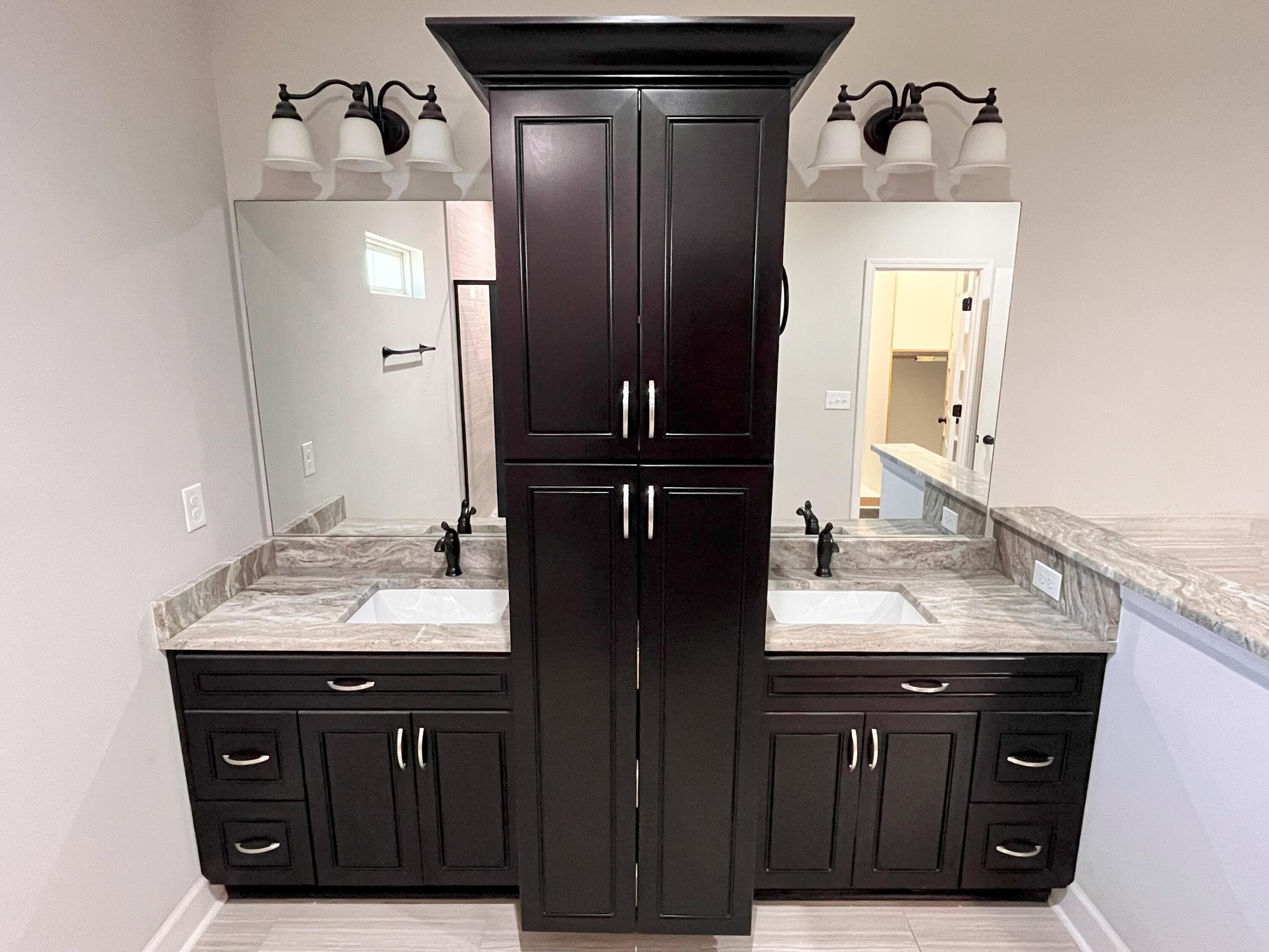 5182 Rabbit Run Crestview, FL 32539 - Photo 15 of 35 a bathroom with a granite countertop sink and a mirror
