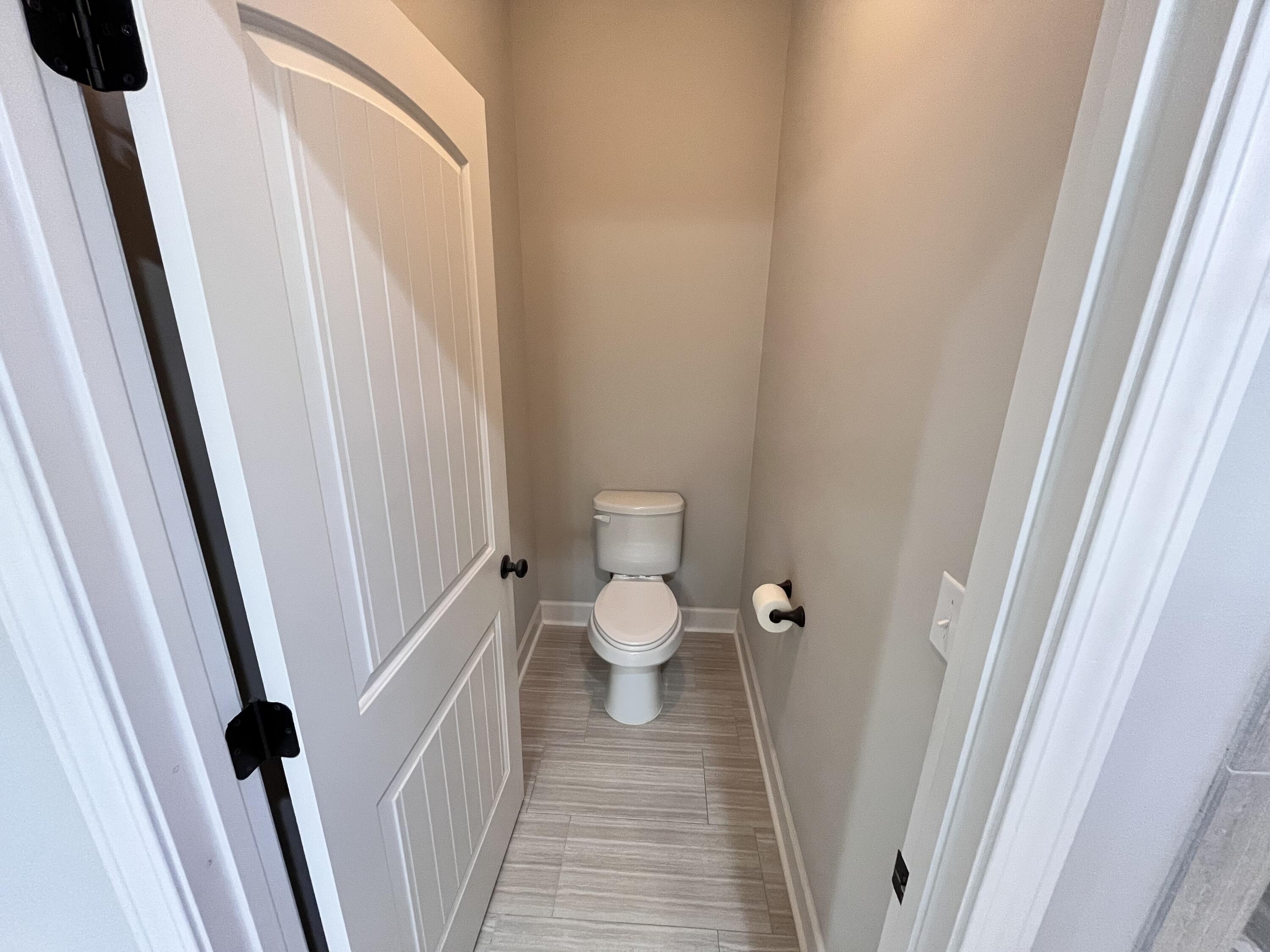 5182 Rabbit Run Crestview, FL 32539 - Photo 16 of 35 a bathroom with a toilet and a shower