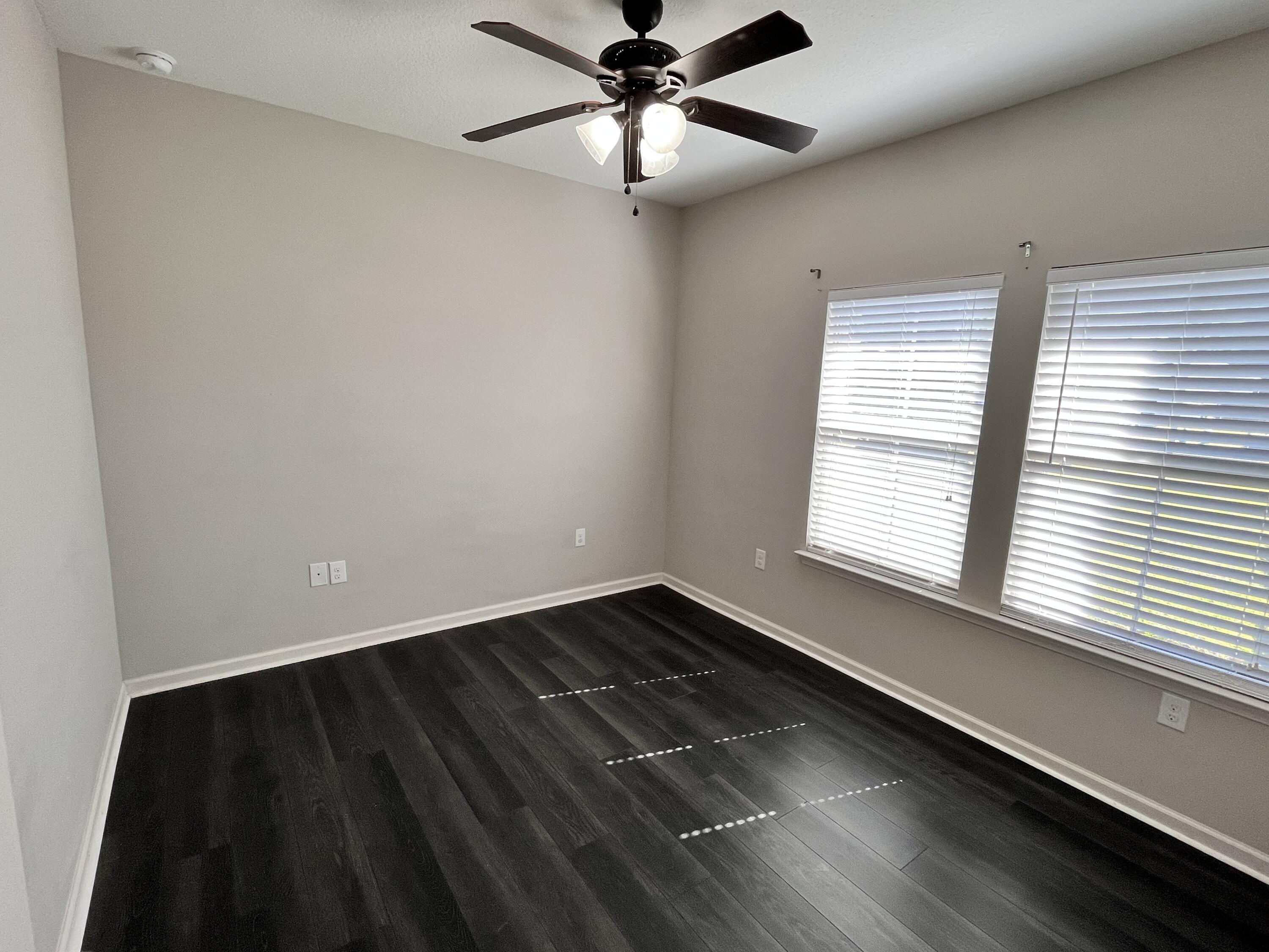5182 Rabbit Run Crestview, FL 32539 - Photo 8 of 35 a view of an empty room with a window
