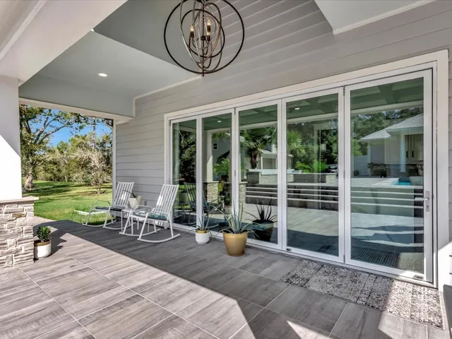 a spacious bedroom with a bed and window