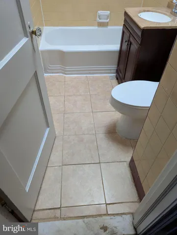 a bathroom with a sink and toilet
