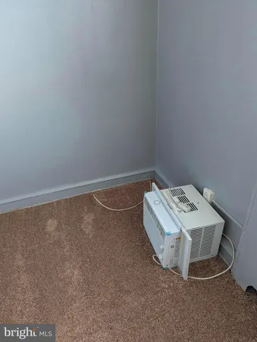 a room with a bed and with a window