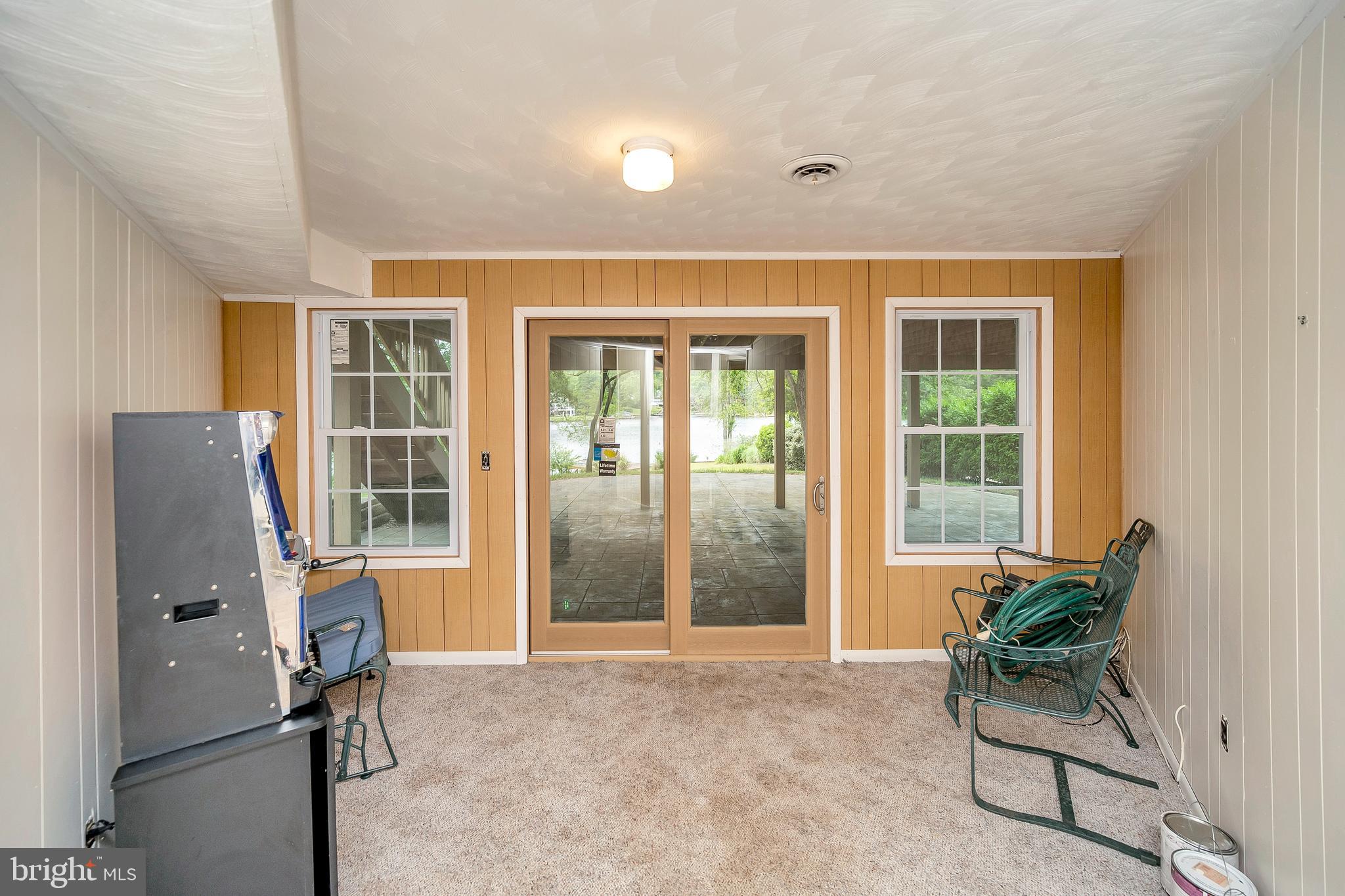 116 Lee Circle Locust Grove, VA 22508 - Photo 14 of 30 Lower level entrance to patio and lake