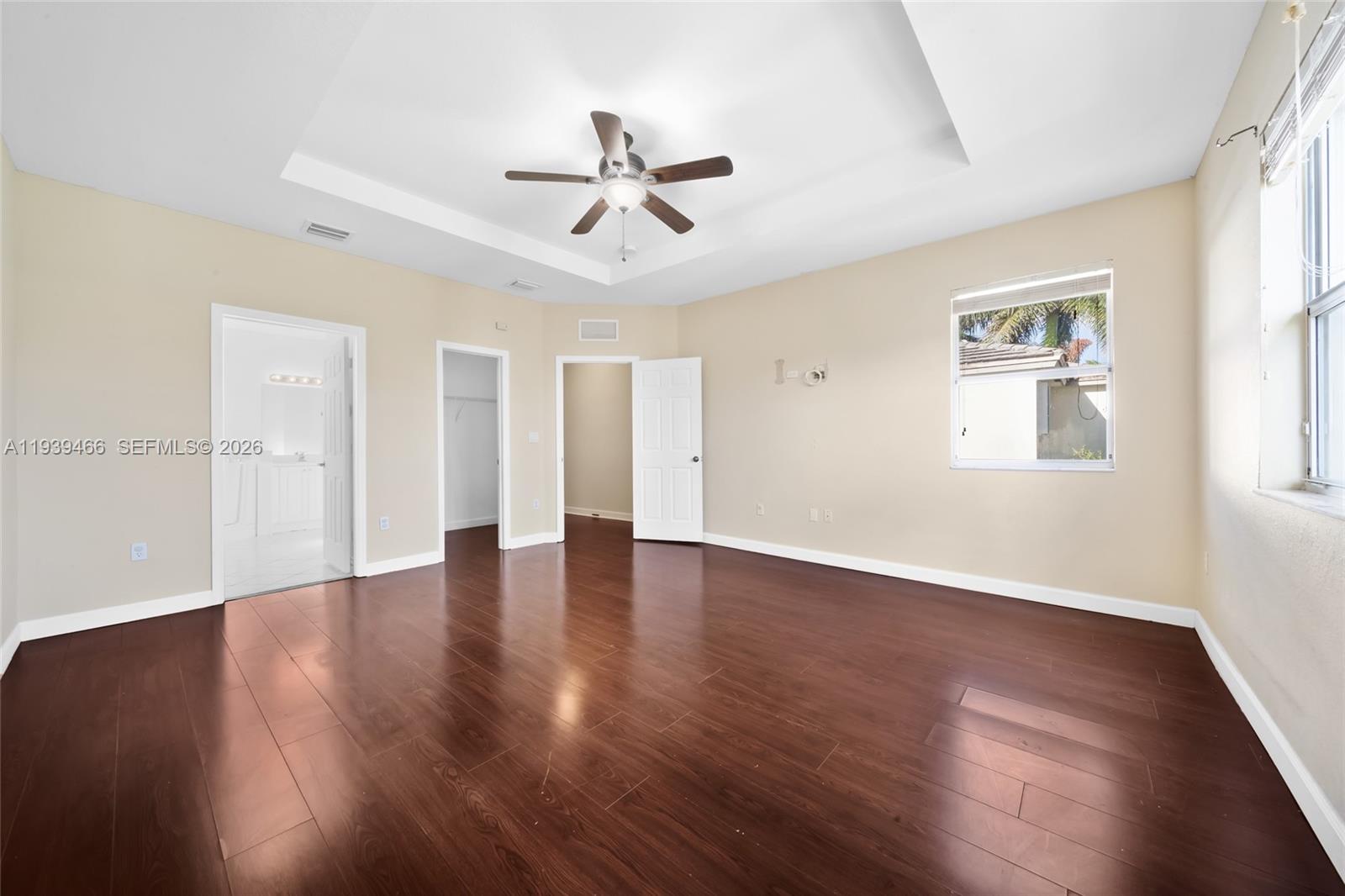 3641 Northeast 4th Street Homestead, FL 33033 - Photo 18 of 29 a view of an empty room with wooden floor and a window
