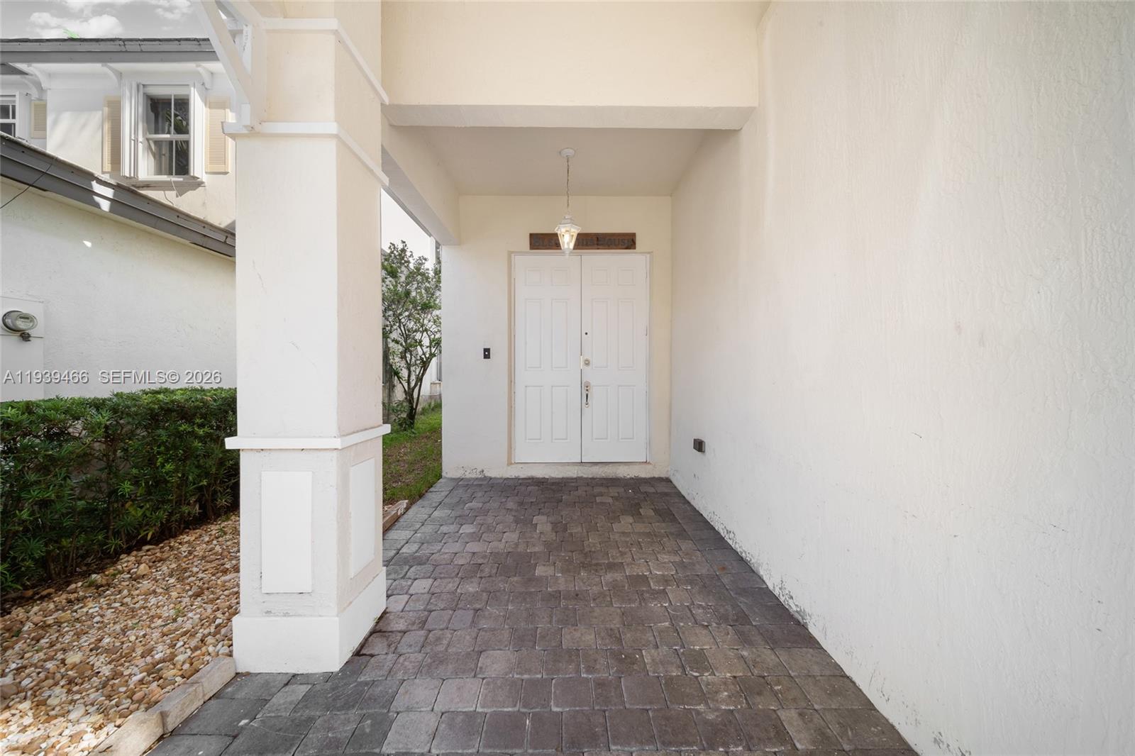 3641 Northeast 4th Street Homestead, FL 33033 - Photo 2 of 29 a view of a hallway with a white walls