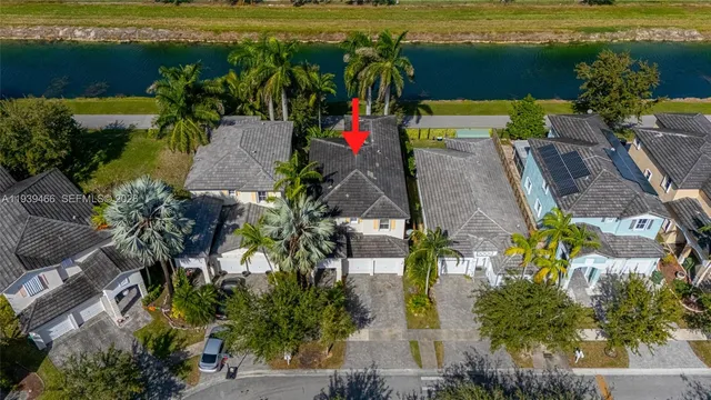 an aerial view of a houses with outdoor space