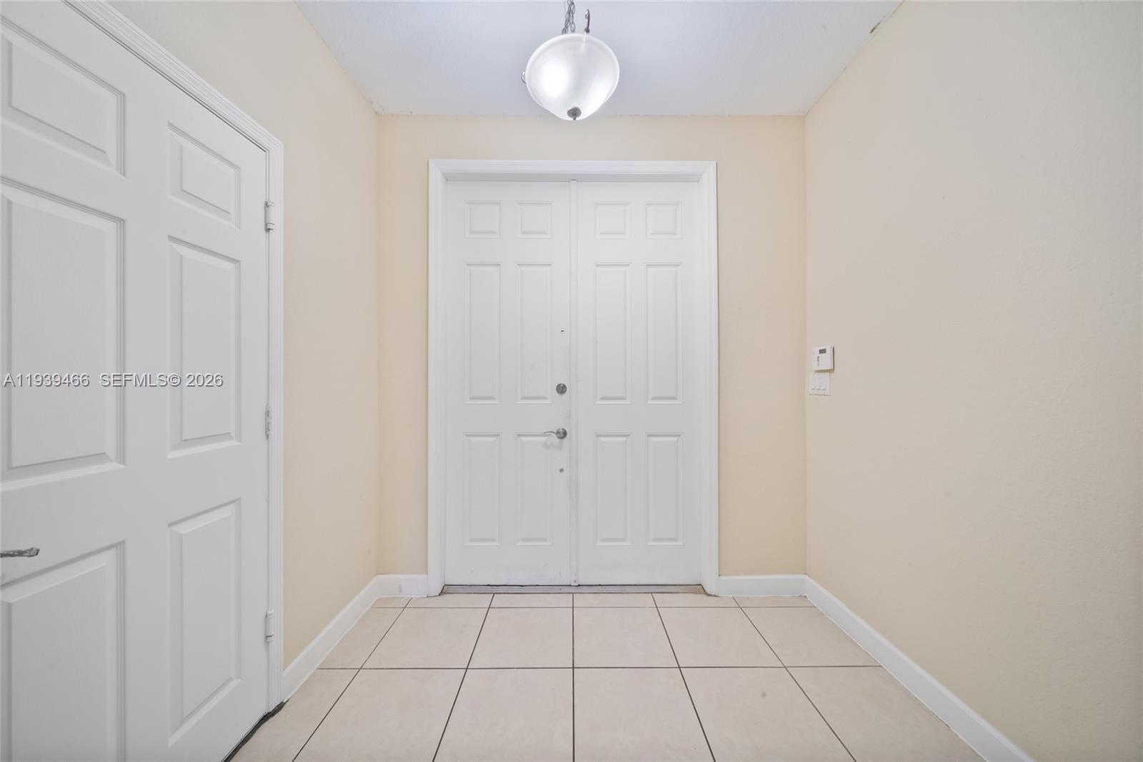 3641 Northeast 4th Street Homestead, FL 33033 - Photo 3 of 29 a view of an empty room and window