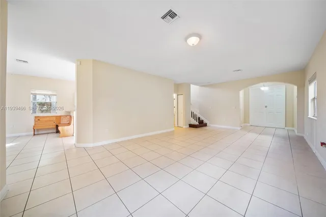 a view of an empty room and window