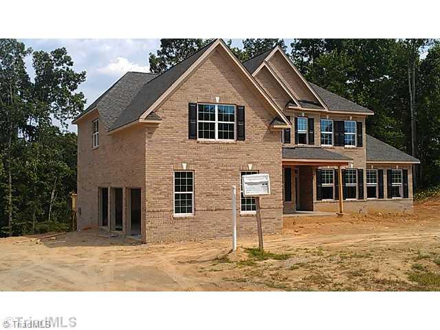 7895 Newhaven Drive Oak Ridge, NC 27310 - Photo 2 of 3 Exterior Front. Bainbridge II Plan: 3 Car Bay Garage