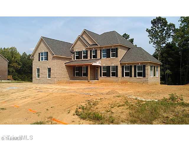 7895 Newhaven Drive Oak Ridge, NC 27310 - Photo 3 of 3 Exterior Front. Bainbrisge II: Hard to find Conservatory is on the right wing of the home.