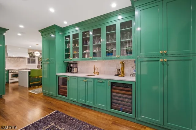 a living room with furniture rug and a window