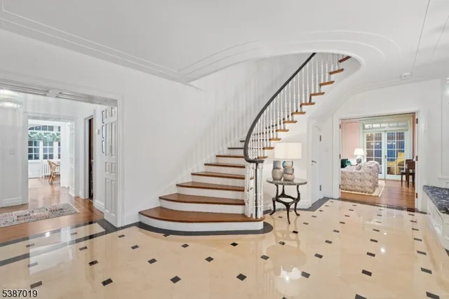 a view of a entryway door with wooden floor