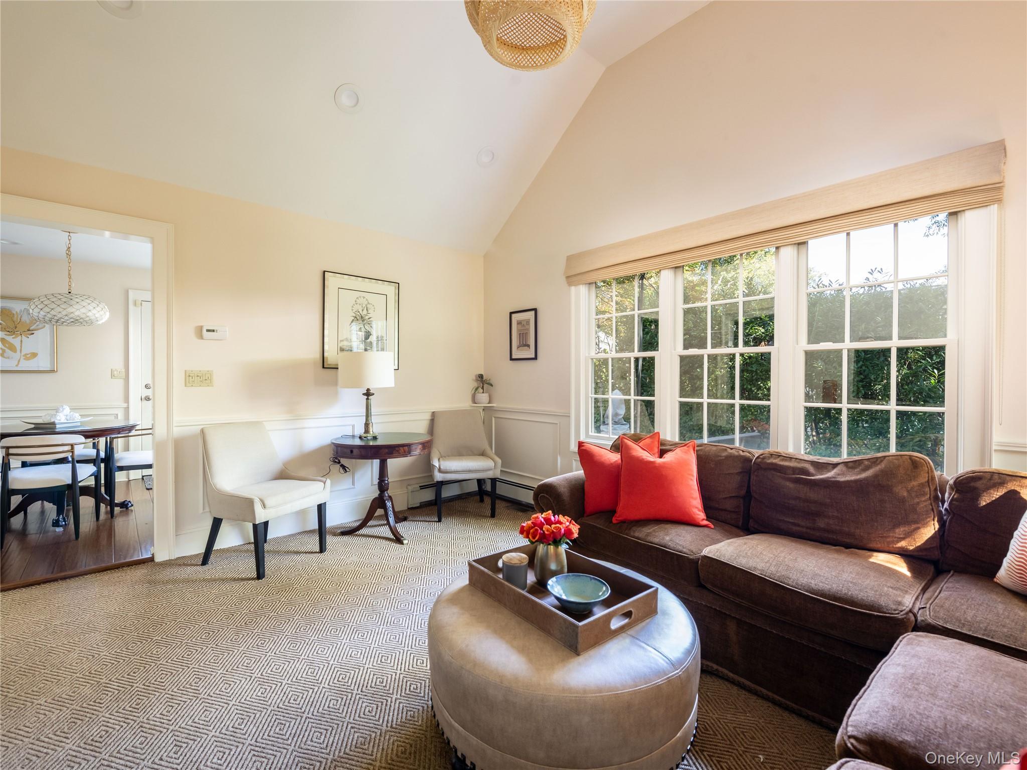 50 Eakins Road Manhasset, NY 11030 - Photo 13 of 24 a living room with furniture and a large window