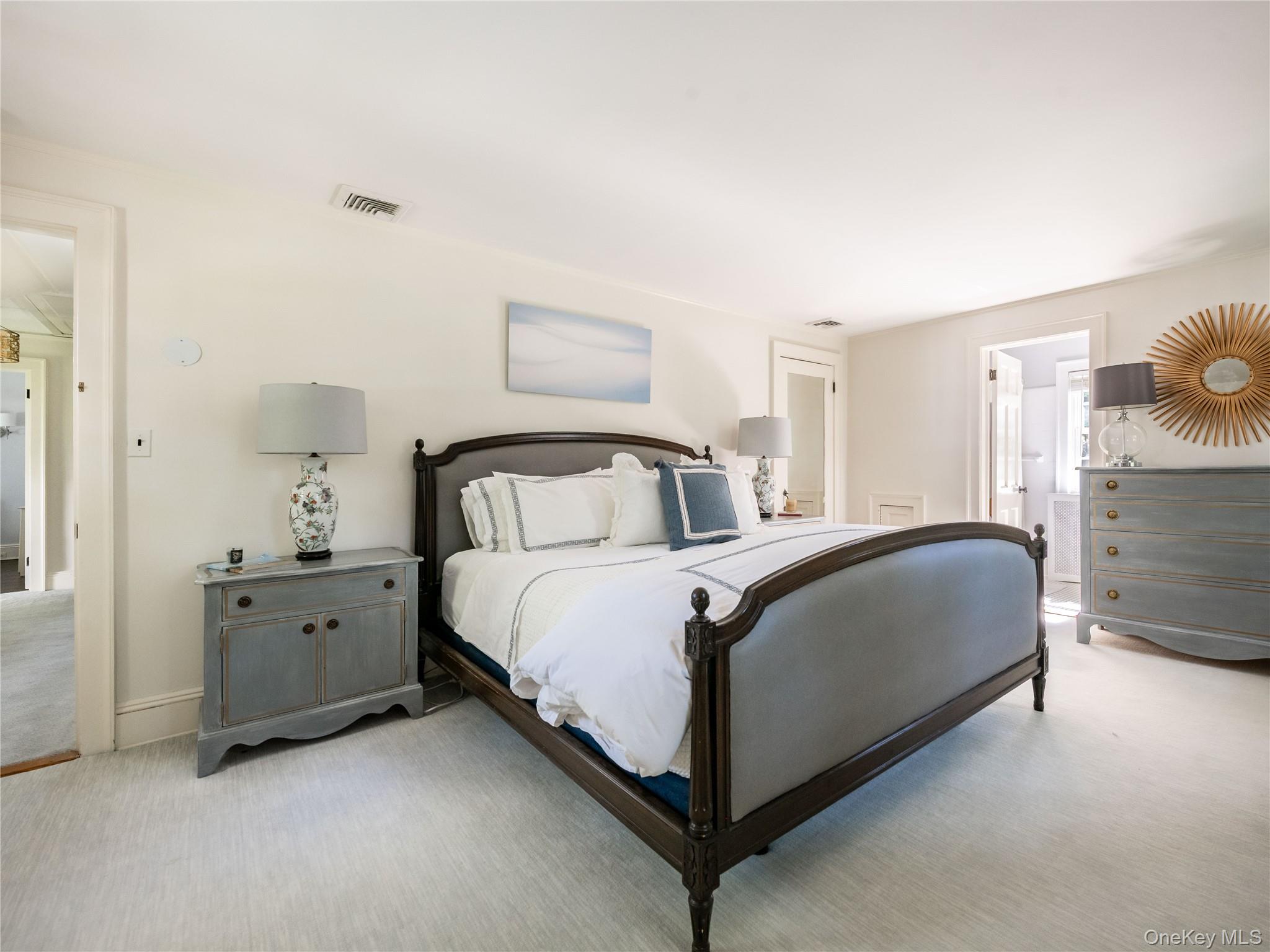 50 Eakins Road Manhasset, NY 11030 - Photo 16 of 24 a bedroom with a bed and window