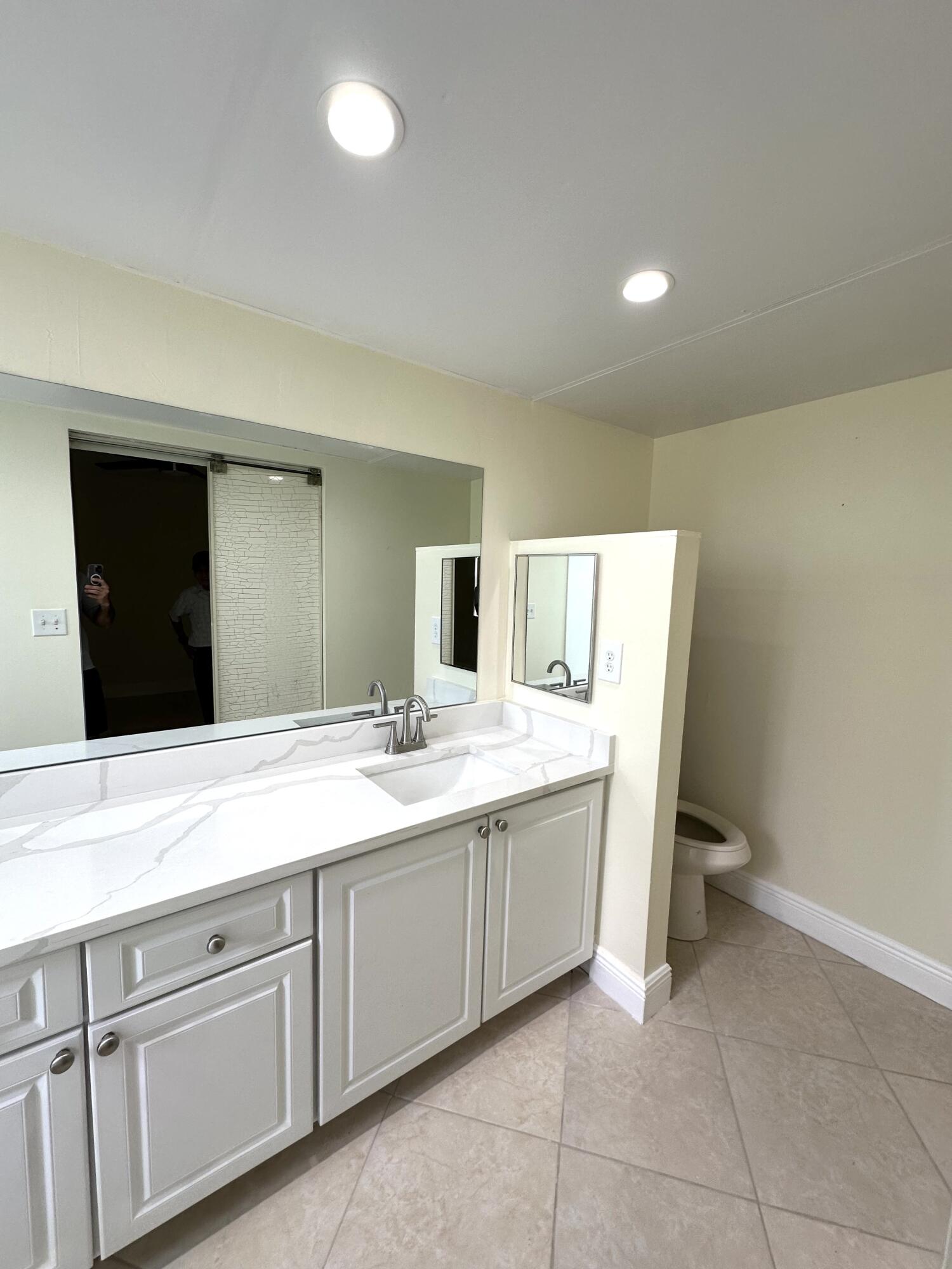 9440 Southwest 8th Street, Unit 109 Boca Raton, FL 33428 - Photo 6 of 14 Primary Bathroom