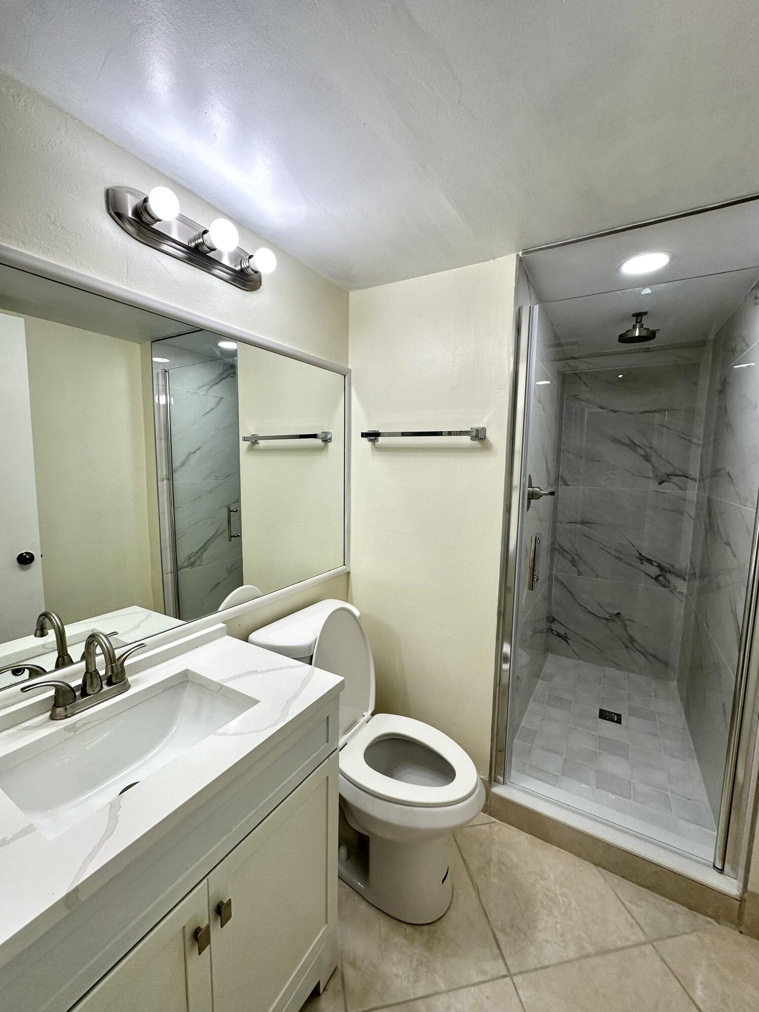 9440 Southwest 8th Street, Unit 109 Boca Raton, FL 33428 - Photo 10 of 14 Guest Bathroom