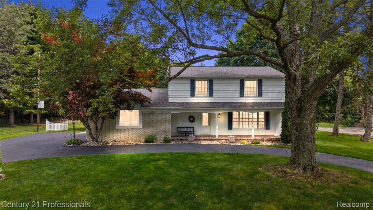 633 Foxhall Road Bloomfield Hills, MI 48304 - Photo 1 of 61 Colonial-style residence featuring white siding and brick accents