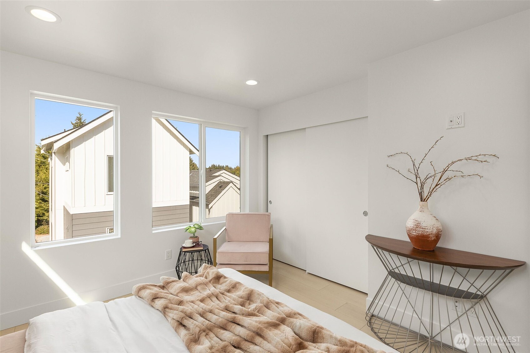 911 North 98th Street, Unit A Seattle, WA 98103 - Photo 18 of 26 a bedroom with furniture and a window