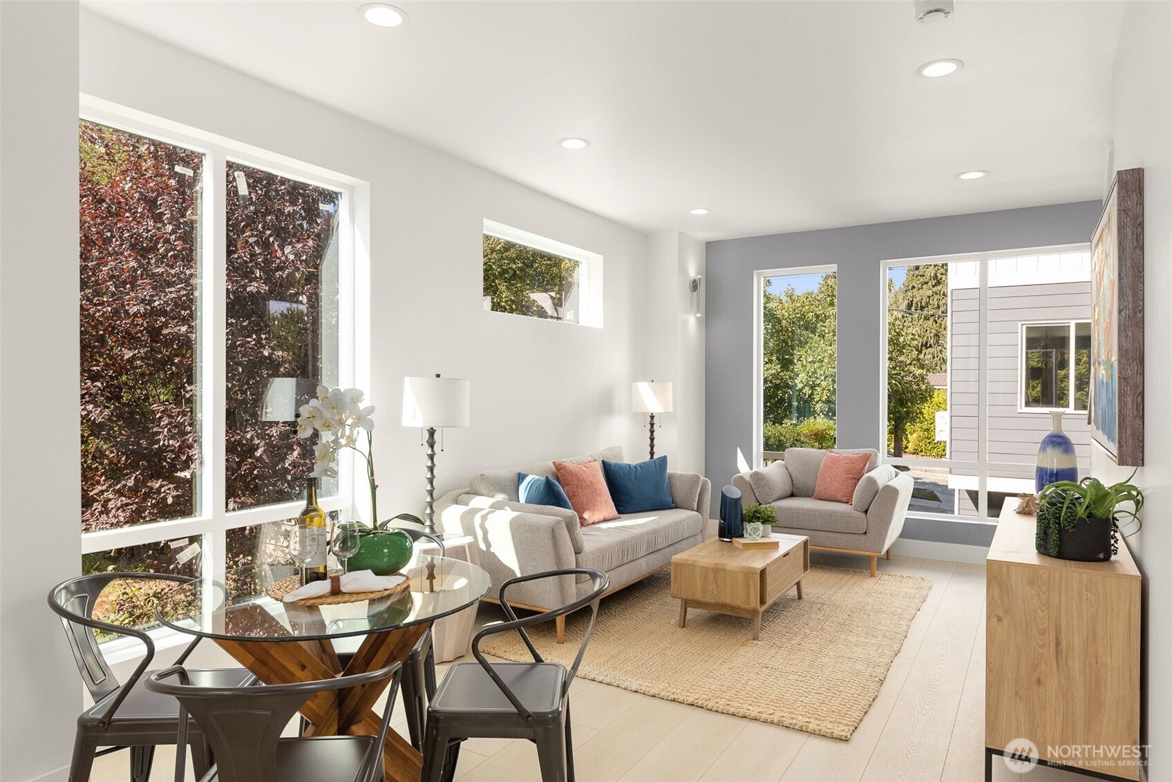 911 North 98th Street, Unit A Seattle, WA 98103 - Photo 5 of 26 a living room with furniture and a large window