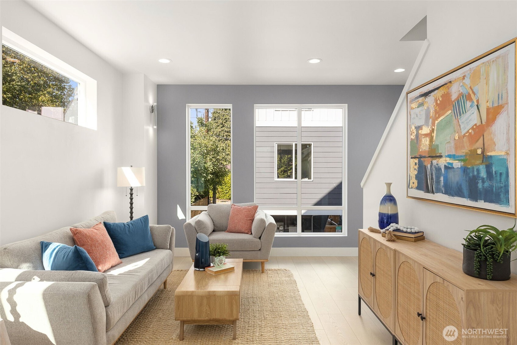 911 North 98th Street, Unit A Seattle, WA 98103 - Photo 6 of 26 a living room with furniture and a large window