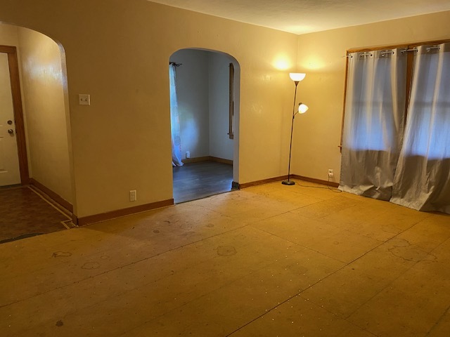 321 West 3rd Street Spring Valley, IL 61362 - Photo 6 of 14 an empty room with a mirror