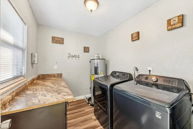 a utility room with dryer and washer
