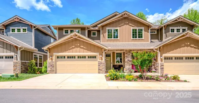 a view of a brick house with a large windows