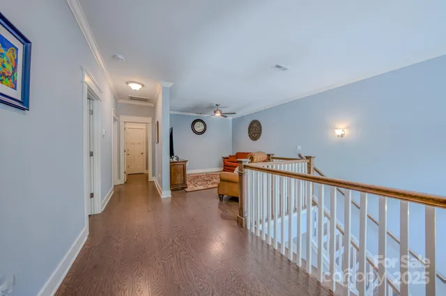 a view of entryway with wooden floor
