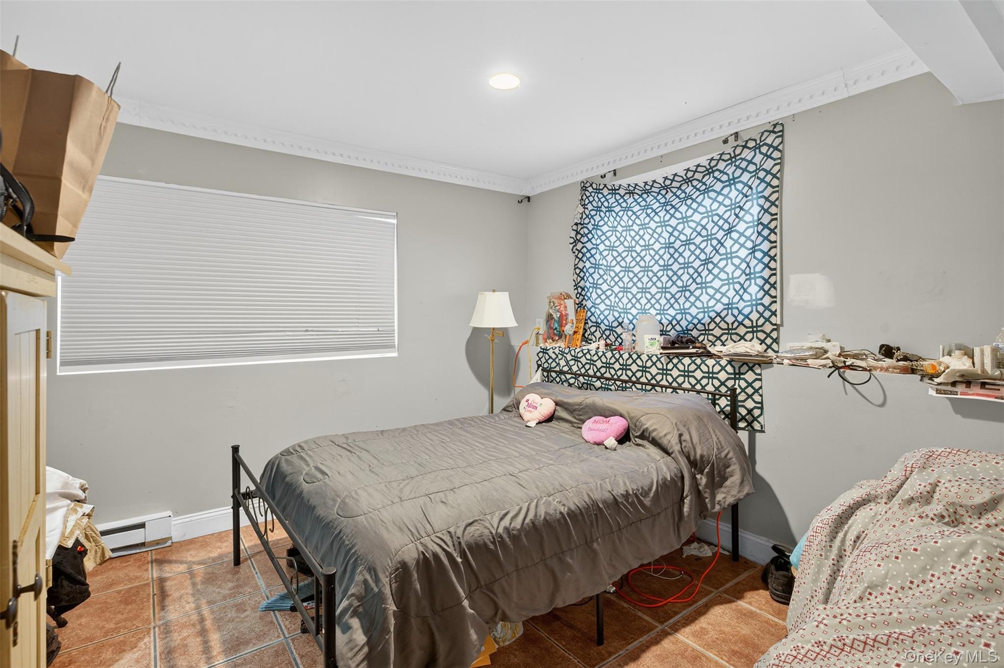 39 Peddler Hill Road Monroe, NY 10950 - Photo 16 of 30 a bedroom with a bed and flat screen tv