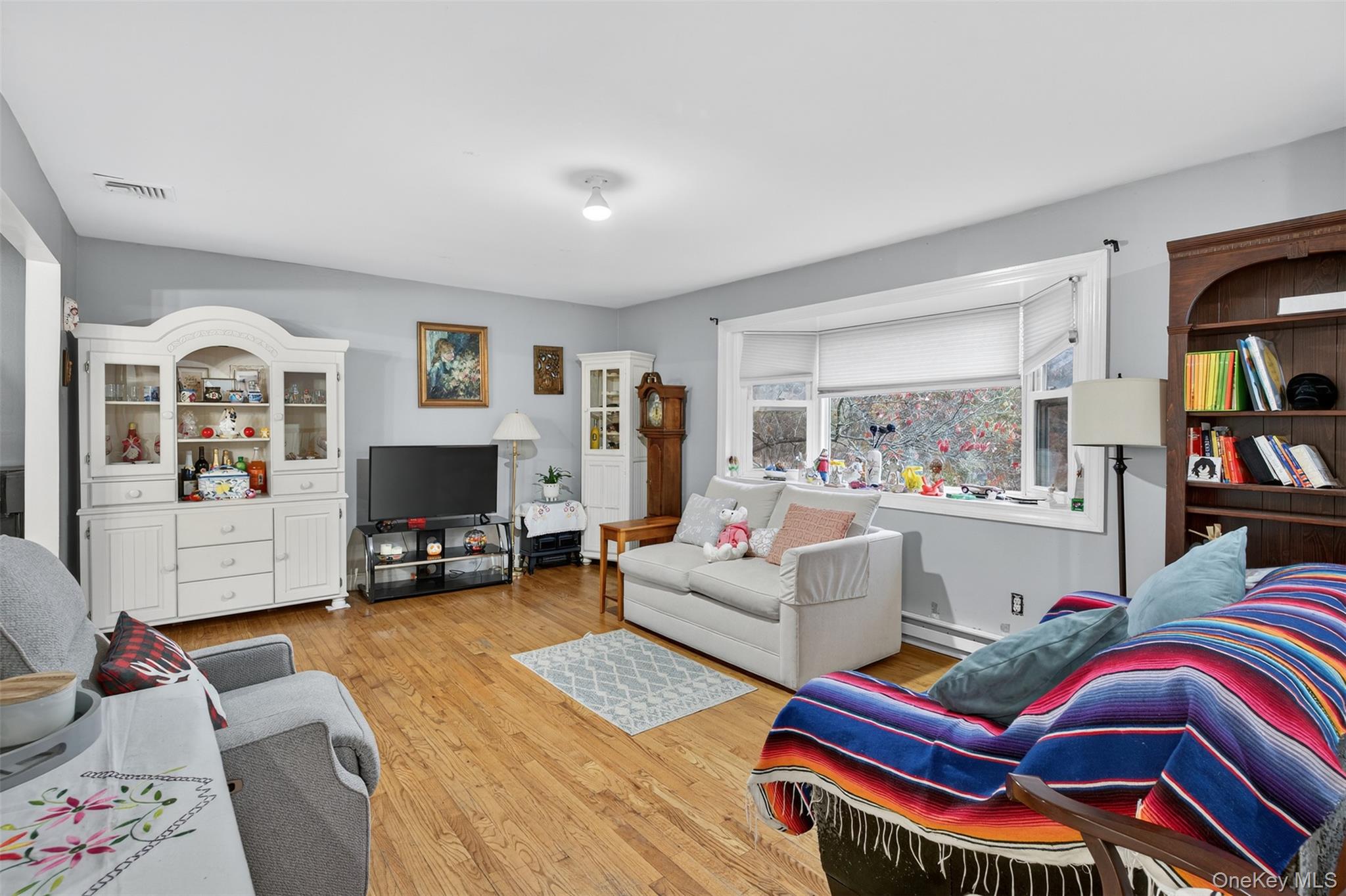 39 Peddler Hill Road Monroe, NY 10950 - Photo 6 of 30 a living room with furniture and a flat screen tv