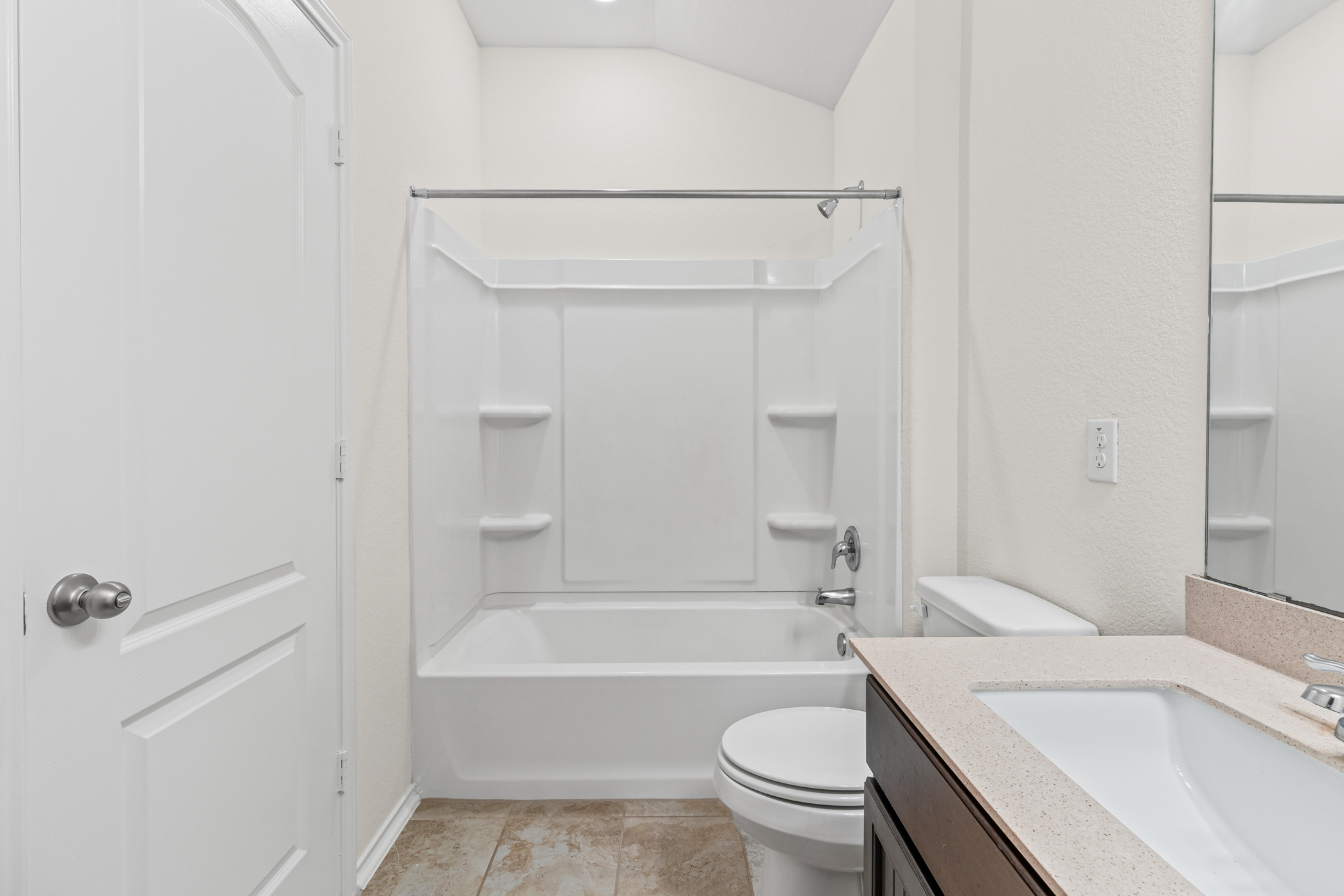 17015 Gibbons Path Round Rock, TX 78664 - Photo 20 of 29 a bathroom with a sink a toilet and a bathtub