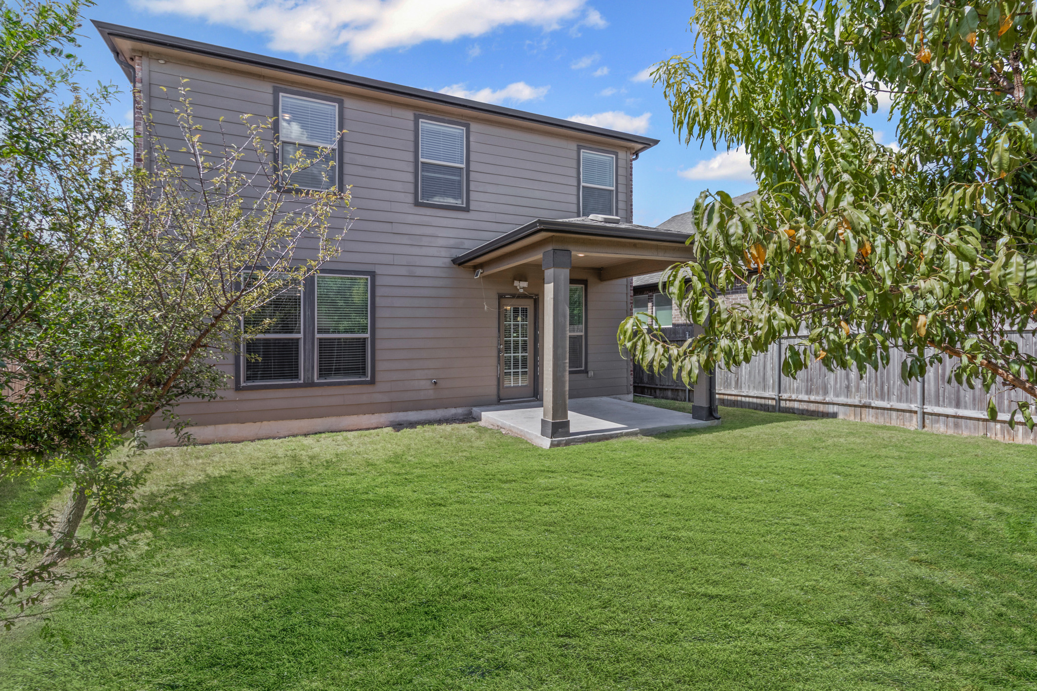 17015 Gibbons Path Round Rock, TX 78664 - Photo 25 of 29 a view of a house with a yard