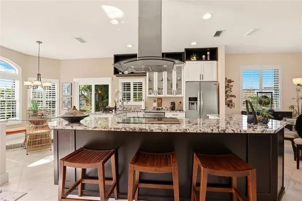 a kitchen with counter top space and appliances